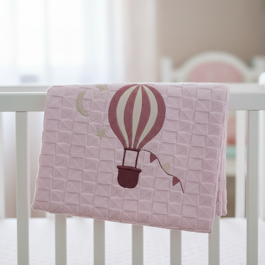 Copertina sulla culla