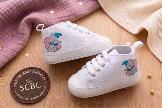 Scarpine culla Dumbo - vista coppia sfondo legno