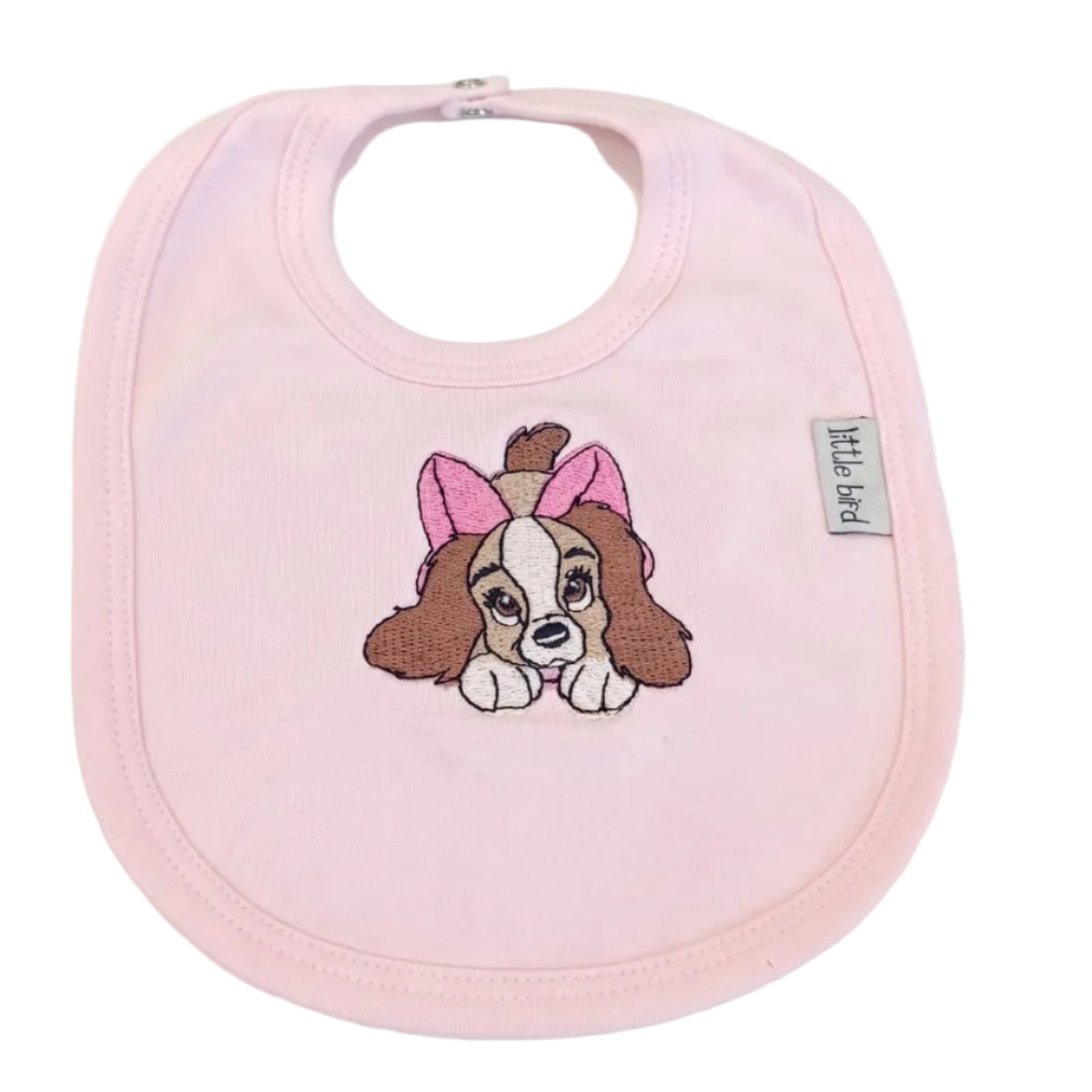 Bavetta rosa per neonata con ricamo Lilli su sfondo bianco