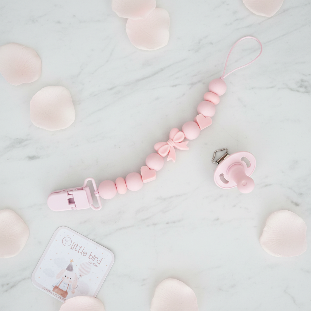 Portaciuccio Fiocchetto Rosa - flat lay marmo