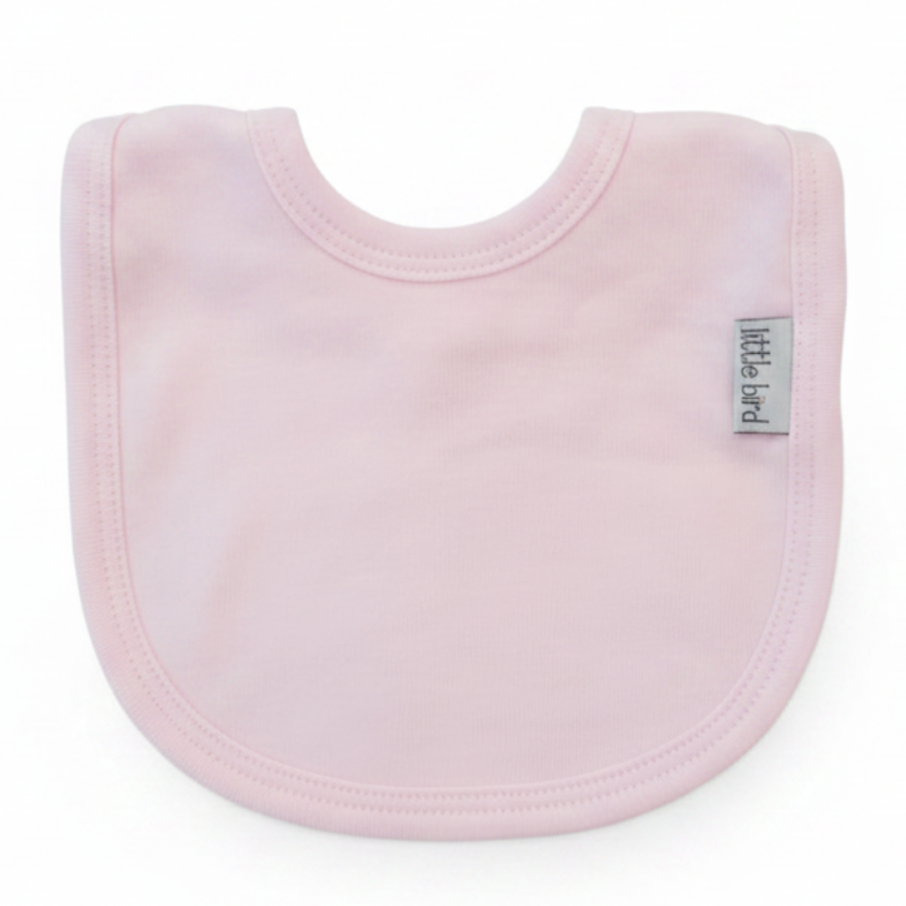 Bavetta rosa Little Bird sfondo bianco professionale