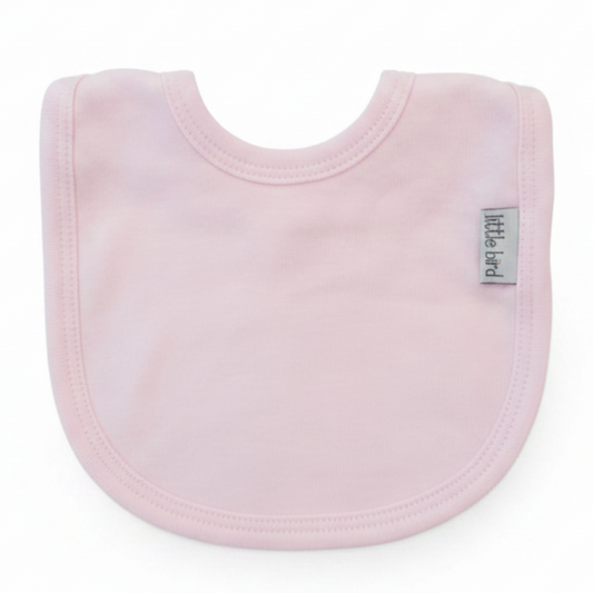 Bavetta rosa Little Bird sfondo bianco professionale