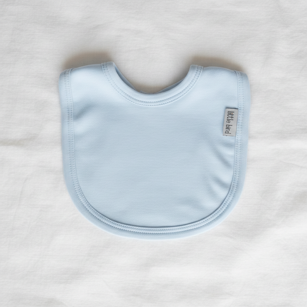 Flat lay bavetta celeste Little Bird